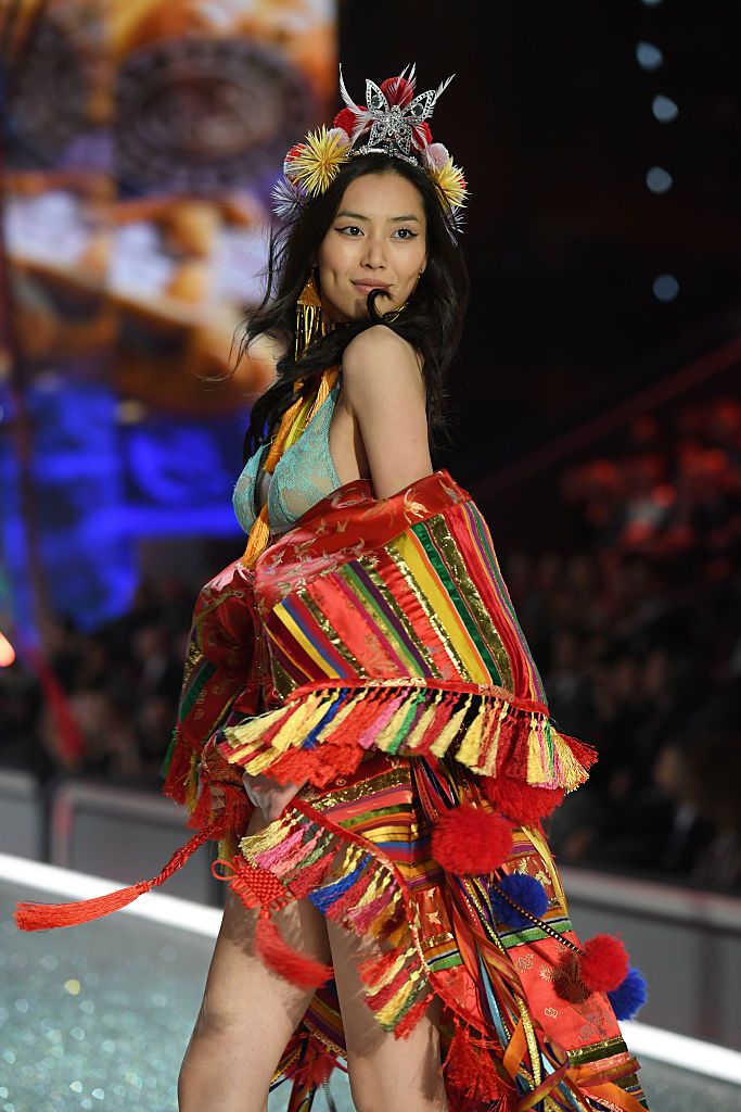 LONDON, ENGLAND - DECEMBER 02:  Model Adriana Lima walks the runway during the 2014 Victoria's Secret Fashion Show at Earl's Court Exhibition Centre on December 2, 2014 in London, England.  (Photo by Dimitrios Kambouris/Getty Images for Victoria's Secret)