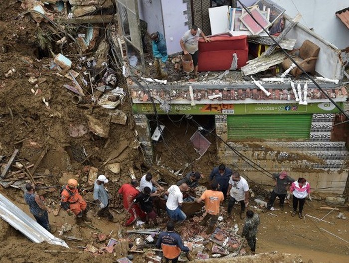 Aerial view after a mudslide in Petropolis, Brazil on February 16, 2022. - Large scale flooding destroyed hundreds of properties and claimed at least 34 lives in the area. (Photo by Florian PLAUCHEUR / AFP)