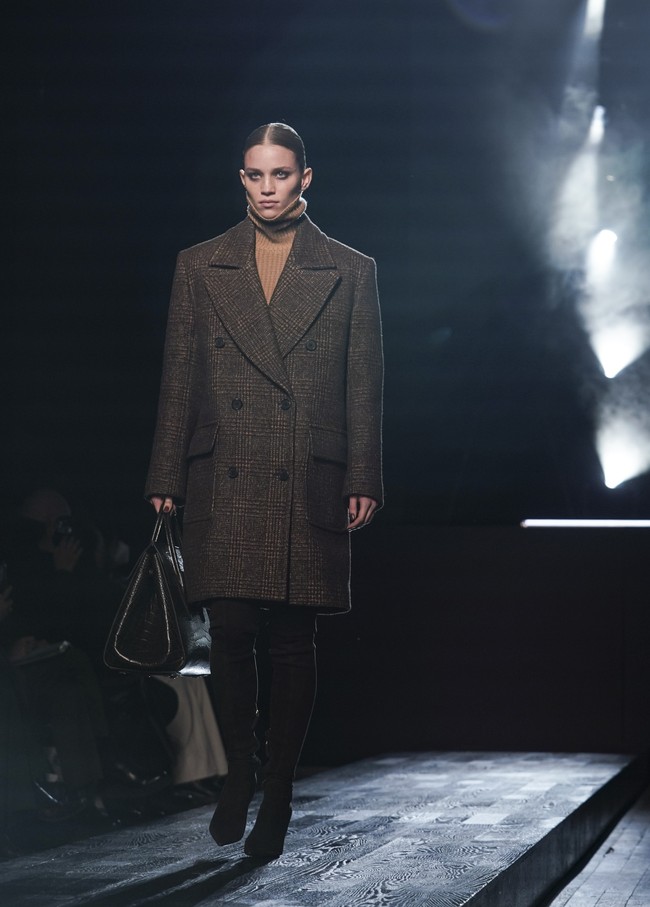 Fashion show koleksi Michael Kors Fall/Winter 2022 menampilkan busana yang menggambarkan tentang ketangguhan, kepercayaan diri, kekuatan dan juga kebenaran. Foto: Dok. AP Photo/Bebeto Matthews.