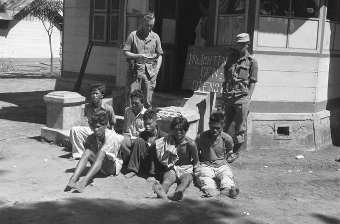 A group of Republican fighters to be interrogated by the Intelligence and Security Group in Sidikalang, Northwest Sumatra, early in 1949, in todays Indonesia, is seen in this handout photo provided to Reuters on February 17, 2022. National Archives/Handout via REUTERS ATTENTION EDITORS - THIS IMAGE HAS BEEN SUPPLIED BY A THIRD PARTY. MANDATORY CREDIT. NO RESALES. NO ARCHIVES.