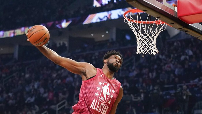 Philadelphia 76ers' Joel Embiid goes up for a slam during the first half of the NBA All-Star basketball game, Sunday, Feb. 20, 2022, in Cleveland. (AP Photo/Charles Krupa)