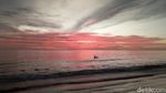 Foto Senja Dramatis di Pantai Binasi