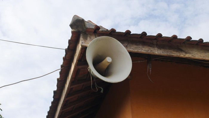 Old white speaker in the corner of an old mosque in a rural area in Indonesia