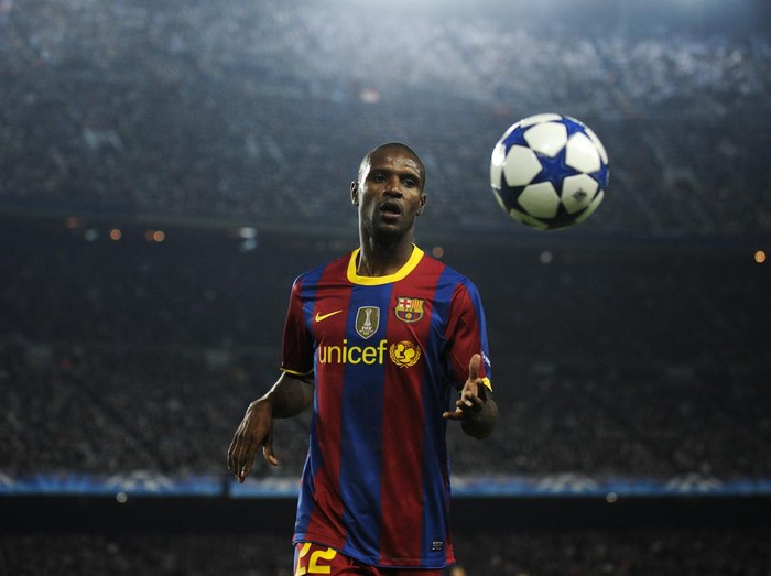 BARCELONA, SPAIN - OCTOBER 20:  Eric Abidal of Barcelona runs to catch the ball during the UEFA Champions League group D match between Barcelona and FC Copenhagen at the Camp nou stadium on October 20, 2010 in Barcelona, Spain. Barcelona won the match 2-0. (Photo by David Ramos/Getty Images)