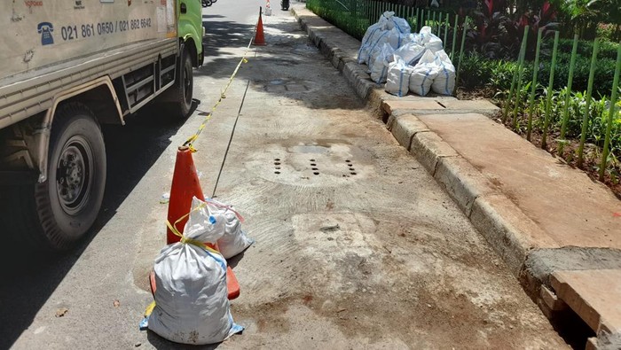 Sumur resapan di Jl Karet Karya selesai diperbiki, Selasa (22/2/2022).