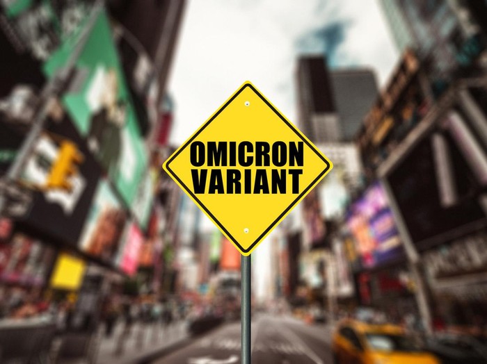 covid omicron variant alert street sign