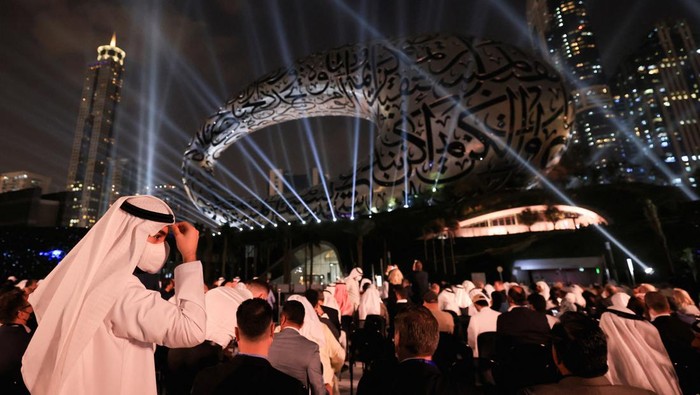 People attend the opening ceremony of the Museum of the Future in Dubai, United Arab Emirates, February 22, 2022. REUTERS/Christopher Pike