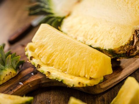 Sliced Pineapple on Chopping Board