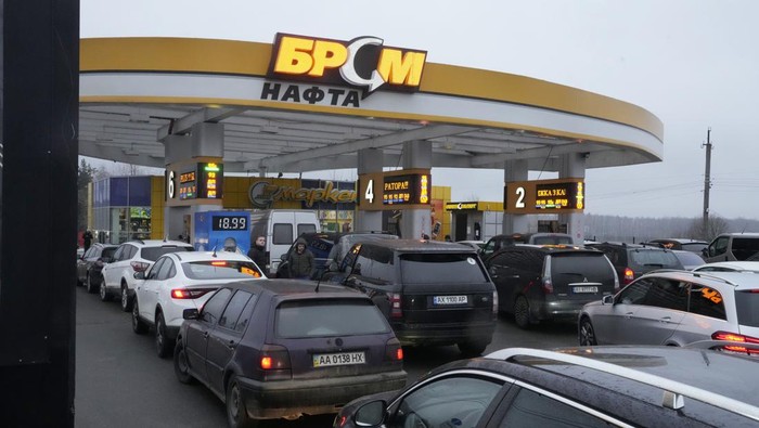 Traffic jams are seen as people leave the city of Kyiv, Ukraine, Thursday, Feb. 24, 2022. Russian President Vladimir Putin on Thursday announced a military operation in Ukraine and warned other countries that any attempt to interfere with the Russian action would lead to 