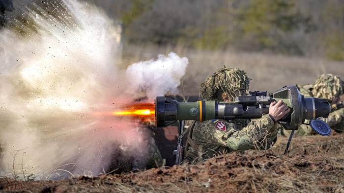 A Ukrainian serviceman fires an NLAW anti-tank weapon during an exercise in the Joint Forces Operation, in the Donetsk region, eastern Ukraine, Tuesday, Feb. 15, 2022. (AP Photo/Vadim Ghirda)