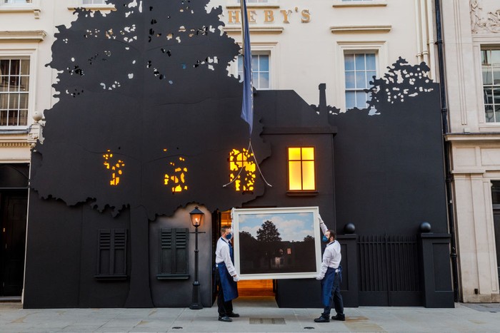 Lelang Lukisan Surealis Rene Magritte Senilai Rp 647 Miliar LONDON, ENGLAND - FEBRUARY 23: Sothebyβs technicians hold RenΓ© Magritteβs masterwork, Lβempire des lumiΓ¨res, outside the auction houseβs New Bond Street entrance at Sotheby's on February 23, 2022 in London, England. The painting goes on sale on March 2, when it will be offered with an estimate in excess of Β£45 million. To coincide with its exhibition, Sothebyβs London building has been transformed to resemble the artistβs masterpiece of Surrealism. (Photo by Tristan Fewings/Getty Images for Sotheby's)
