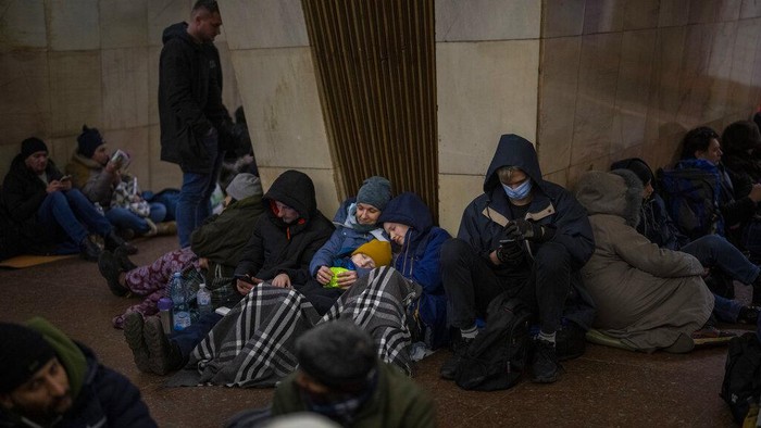 People rest in the Kyiv subway, using it as a bomb shelter in Kyiv, Ukraine, Thursday, Feb. 24, 2022. Russia has launched a full-scale invasion of Ukraine, unleashing airstrikes on cities and military bases and sending troops and tanks from multiple directions in a move that could rewrite the worlds geopolitical landscape. (AP Photo/Emilio Morenatti)