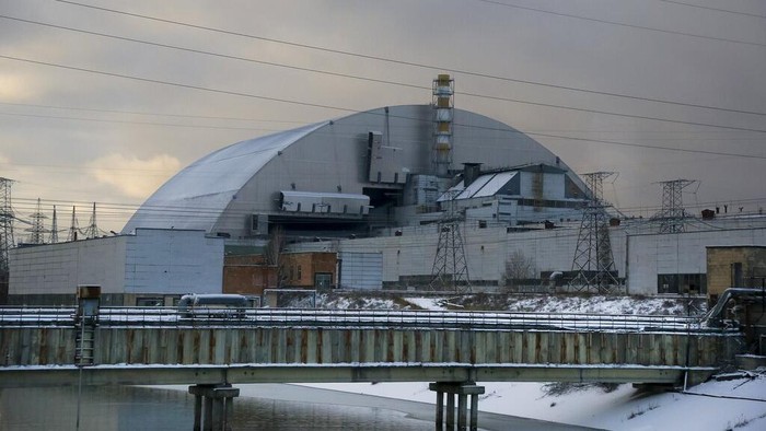 A new shelter is installed over the exploded reactor at the Chernobyl nuclear plant, Chernobyl, Ukraine, Tuesday, Nov. 29, 2016. A massive shelter has finally been installed over the exploded reactor at the Chernobyl nuclear plant, one of the most ambitious engineering projects in the world. (AP Photo/Efrem Lukatsky)