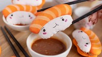 Sushi yang lucu ini ternyata bukan dibuat dari nasi dan ikan. Sushi ini justru sebuah macaron yang dilengkapi dengan saus karamel, mirip dengan soy sauce.Foto: Brightside