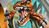Menyukai dinosaurus, sebuah kue sengaja didesain lebih menyeramkan. Kuku-kuku dari T-Rexnya bahkan sengaja dibuat tiga dimensi sehingga terlihat seolah keluar. Foto: Brightside