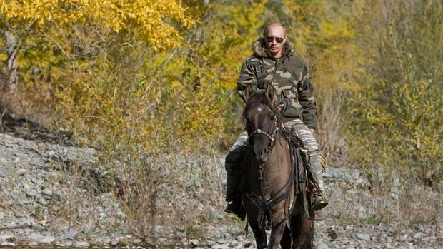 In this Sept. 2010 photo released on Saturday, Oct. 30, 2010, Russian Prime Minister Vladimir Putin rides a horse during his trip in Ubsunur Hollow in the Siberian Tyva region (also referred to as Tuva), on the border with Mongolia, Russia. (AP Photo/RIA Novosti, Alexei Druzhinin, Pool)