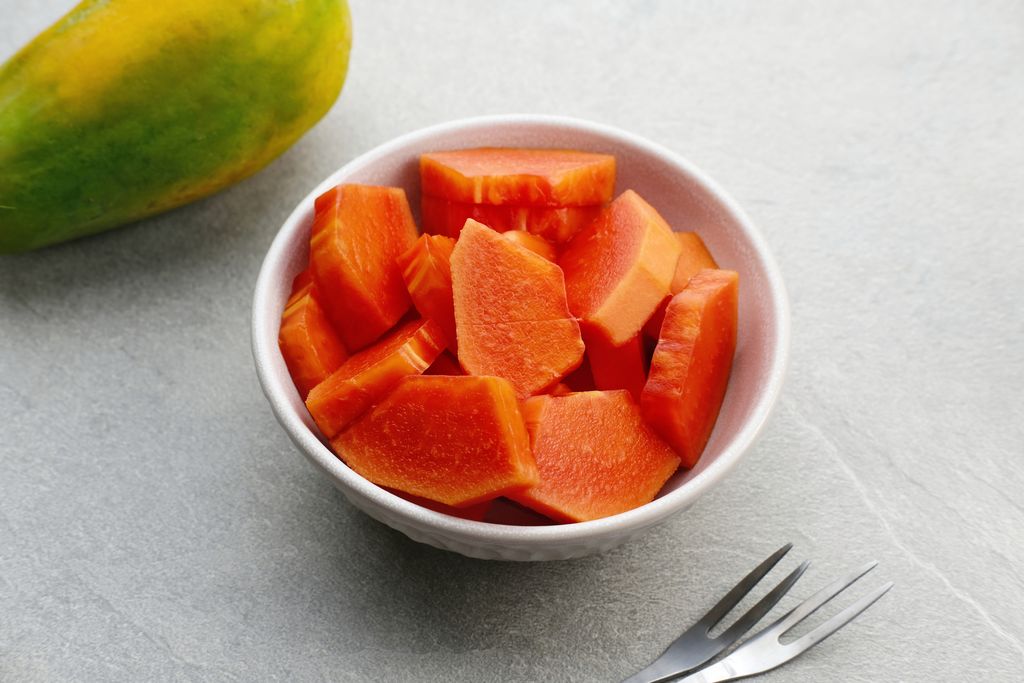 Healthy and fresh cut papaya fruit or sliced papaya, served in a bowl