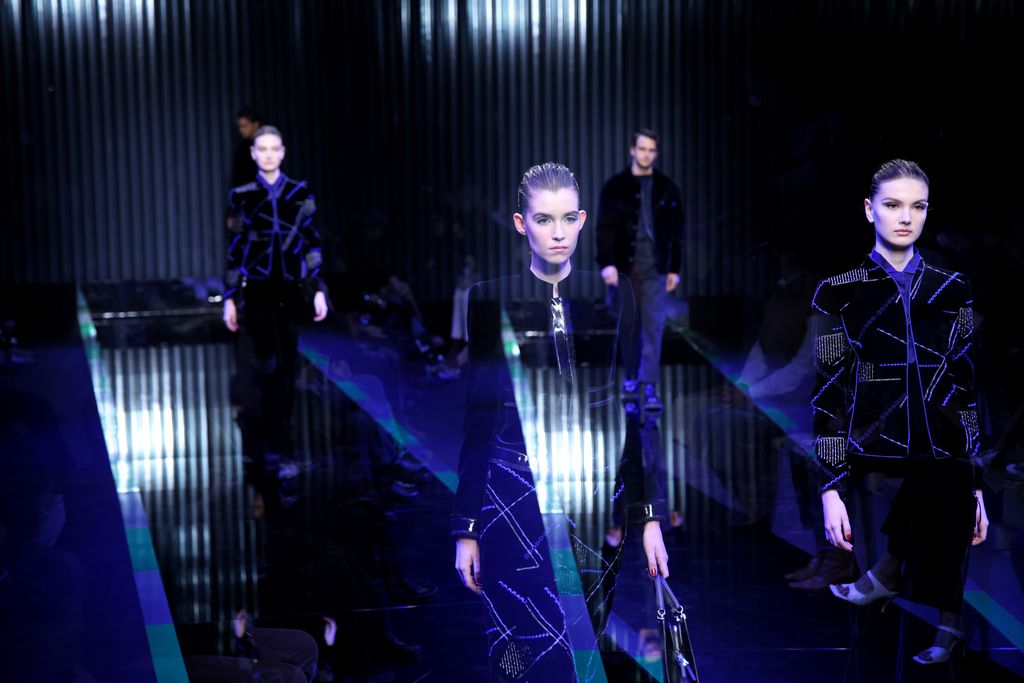 MILAN, ITALY - FEBRUARY 27: Anti-war protesters show pro Ukraine signages outside the Giorgio Armani fashion show during the Milan Fashion Week Fall/Winter 2022/2023 on February 27, 2022 in Milan, Italy. (Photo by Vittorio Zunino Celotto/Getty Images)