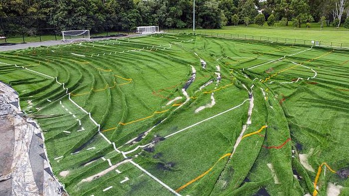 BRISBANE, AUSTRALIA - FEBRUARY 28: Mitchellton Football Club's field that was destroyed by floodwaters on February 28, 2022 in Brisbane, Australia. Parts of South-East Queensland are experiencing the worst flooding in over a decade, with several towns under evacuation orders and the death toll rising. (Photo by Peter Wallis/Getty Images)