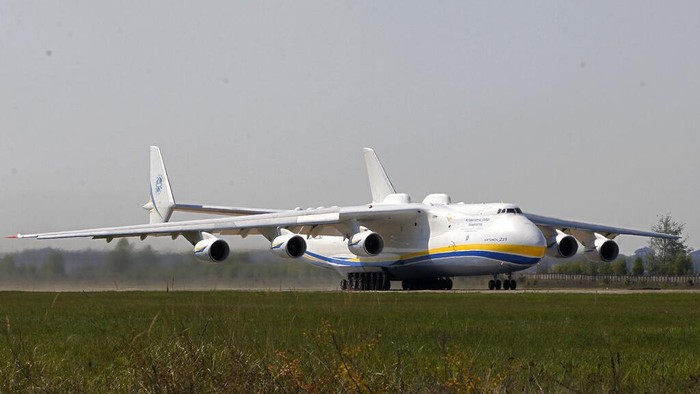 The world's largest airplane, Ukrainian Antonov An-225 Mriya takes off at the  airport  near Hostomel near Kiev , Ukraine, Tuesday, May 10, 2016. The An-225 departed its home base at  Hostomel and flew to Prague, Czech Republic, where it will be loaded with the massive 130-tonne generator and will fly onto Perth, Australia.  (AP Photo/Sergei Chuzavkov)