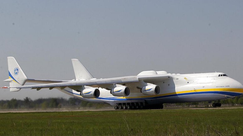 The worlds largest airplane, Ukrainian Antonov An-225 Mriya takes off at the  airport  near Hostomel near Kiev , Ukraine, Tuesday, May 10, 2016. The An-225 departed its home base at  Hostomel and flew to Prague, Czech Republic, where it will be loaded with the massive 130-tonne generator and will fly onto Perth, Australia.  (AP Photo/Sergei Chuzavkov)