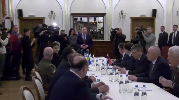 UKRAINE-CRISIS/BELARUS-TALKS Ukrainian Defence Minister Oleksii Reznikov prepares to sit for talks with Vladimir Medinsky, Russia's presidential aide and head of delegation, in the Gomel region, Belarus February 28, 2022 in this still image obtained from video. BelTA/Handout via REUTERS THIS IMAGE HAS BEEN SUPPLIED BY A THIRD PARTY. NO RESALES. NO ARCHIVES. DO NOT OBSCURE LOGO. MANDATORY CREDIT. REFILE - CORRECTING ID OF DEFENCE MINISTER