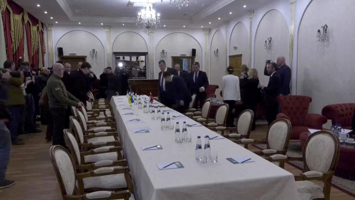 Ukrainian Defence Minister Oleksii Reznikov prepares to sit for talks with Vladimir Medinsky, Russia's presidential aide and head of delegation, in the Gomel region, Belarus February 28, 2022 in this still image obtained from video. BelTA/Handout via REUTERS  THIS IMAGE HAS BEEN SUPPLIED BY A THIRD PARTY. NO RESALES. NO ARCHIVES. DO NOT OBSCURE LOGO. MANDATORY CREDIT. REFILE - CORRECTING ID OF DEFENCE MINISTER