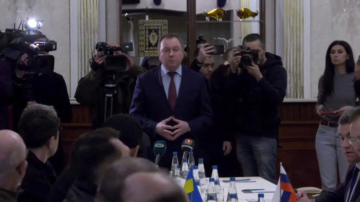 Ukrainian Defence Minister Oleksii Reznikov prepares to sit for talks with Vladimir Medinsky, Russia's presidential aide and head of delegation, in the Gomel region, Belarus February 28, 2022 in this still image obtained from video. BelTA/Handout via REUTERS  THIS IMAGE HAS BEEN SUPPLIED BY A THIRD PARTY. NO RESALES. NO ARCHIVES. DO NOT OBSCURE LOGO. MANDATORY CREDIT. REFILE - CORRECTING ID OF DEFENCE MINISTER