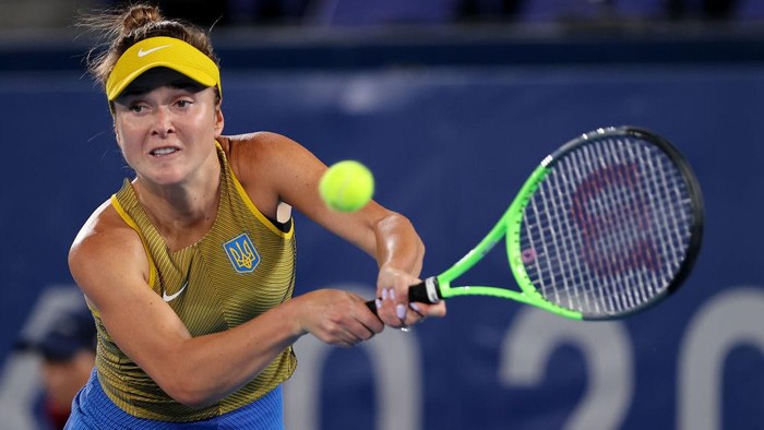 TOKYO, JAPAN - JULY 31: Elina Svitolina of Team Ukraine plays a backhand during her Womens Singles Bronze Medal match against Elena Rybakina of Team Kazakhstan on day eight of the Tokyo 2020 Olympic Games at Ariake Tennis Park on July 31, 2021 in Tokyo, Japan. (Photo by Clive Brunskill/Getty Images)