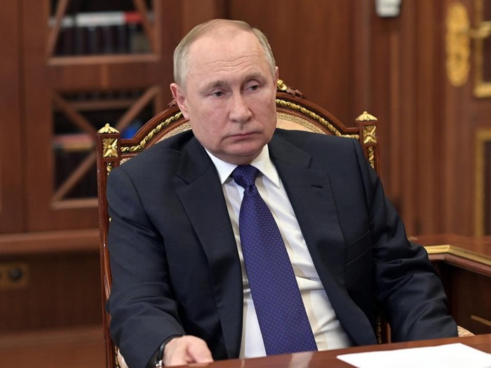 Russian President Vladimir Putin listens to St. Petersburgs governor Alexander Beglov during their meeting in the Kremlin in Moscow, Russia, Tuesday, March 1, 2022. (Alexei Nikolsky, Sputnik, Kremlin Pool Photo via AP)