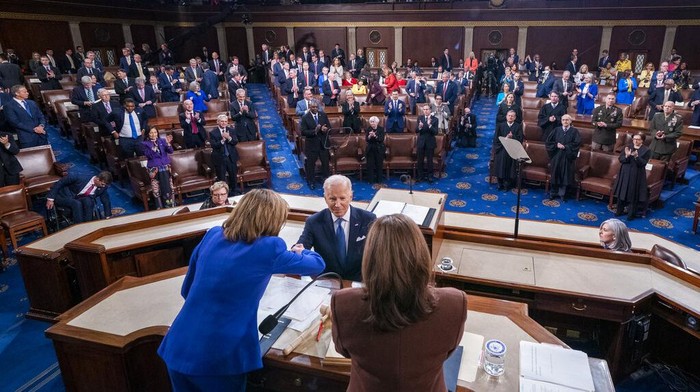 State of the Union President Joe Biden delivers his first State of the Union address to a joint session of Congress at the Capitol, Tuesday, March 1, 2022, in Washington, as House speaker Nancy Pelosi of Calif., looks at a copy of Biden's speech at left.