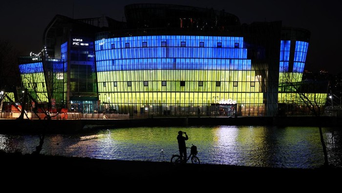 The Sevit floating island is lit in the colour of Ukraine national flag in support of Ukrainians following Russia's invasion against Ukraine, in Seoul, South Korea, March 2, 2022. REUTERS/Kim Hong-Ji