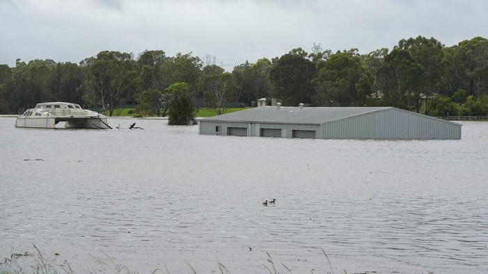 Banjir merendam sejumlah kawasan di Australia sejak beberapa hari terakhir. Di pinggiran Sydney, banjir merendam rumah hingga atap. Ini penampakannya.
