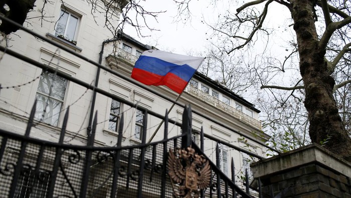 A Russian flag flies outside the Consular Section of the Russian Embassy in London, Tuesday, Feb. 22, 2022. British Prime Minister Boris Johnson says the U.K. will introduce immediate economic sanctions against Russia, and warned that President Vladimir Putin is bent on a full-scale invasion of Ukraine. (AP Photo/David Cliff)