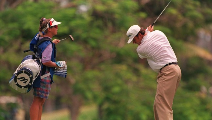 3 NOV 1994: NICK FALDO UNDER THE WATCHFUL EYE OF CADDIE FANNY SUNESSON DURING HIS FIRST ROUND OF 4 UNDER PAR 67 IN THE ALFRED DUNHILL MASTERS IN BALI, INDONESIA. Mandatory Credit: Mike Cooper/ALLSPORT