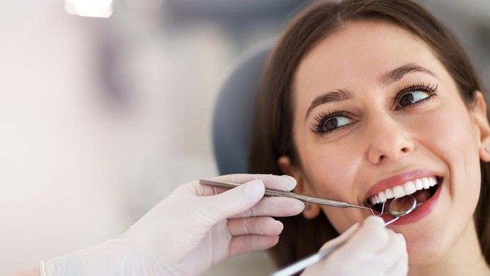 Ilustrasi perawatan gigi ke dokter gigi