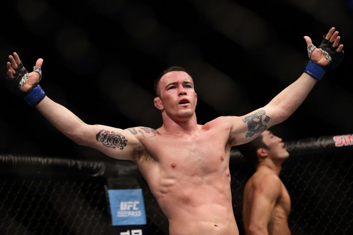 SINGAPORE - JUNE 17: Colby Covington of United States (front) reacts after his fight with Dong Hyun Kim of South Korea (back) in the Welterweight Bout during UFC Singapore Fight Night at Singapore Indoor Stadium on June 17, 2017 in Singapore. (Photo by Suhaimi Abdullah/Getty Images)