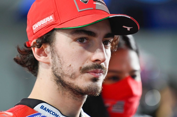 DOHA, QATAR - MARCH 06: Francesco Bagnaia of Italy and Ducati Lenovo Team looks on and prepares to start on the grid during the MotoGP race during the MotoGP of Qatar - Race at Losail Circuit on March 06, 2022 in Doha, Qatar. (Photo by Mirco Lazzari gp/Getty Images,)