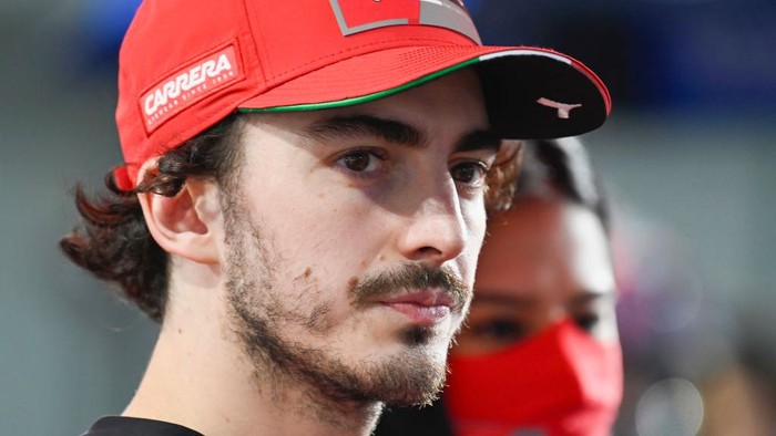 DOHA, QATAR - MARCH 06: Francesco Bagnaia of Italy and Ducati Lenovo Team looks on and prepares to start on the grid during the MotoGP race during the MotoGP of Qatar - Race at Losail Circuit on March 06, 2022 in Doha, Qatar. (Photo by Mirco Lazzari gp/Getty Images,)