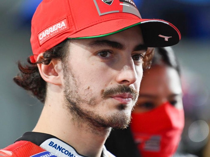 DOHA, QATAR - MARCH 06: Francesco Bagnaia of Italy and Ducati Lenovo Team looks on and prepares to start on the grid during the MotoGP race during the MotoGP of Qatar - Race at Losail Circuit on March 06, 2022 in Doha, Qatar. (Photo by Mirco Lazzari gp/Getty Images,)