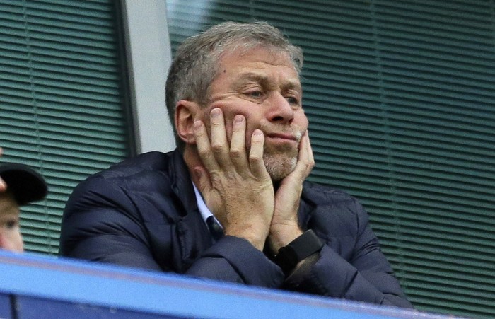 Roman Abramovich FILE - Chelsea soccer club owner Roman Abramovich sits in his box before their English Premier League soccer match against Sunderland at Stamford Bridge stadium in London, Dec. 19, 2015. Chelsea owner Roman Abramovich has on Saturday, Feb. 26, 2022 suddenly handed over the “stewardship and care” of the Premier League club to its charitable foundation trustees. The move came after a member of the British parliament called for the Russian billionaire to hand over the club in the wake of Russia’s invasion of Ukraine. (AP Photo/Matt Dunham, File)