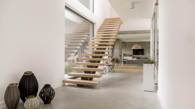 ilustrasi desain tangga rumah Wooden minimalistic stairs in pure big space