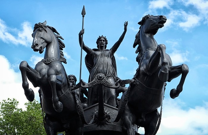 London, UK - June 8, 2013: Statue of Boudicca, the Queen of the Celtic Iceni tribe, riding a horse-drawn chariot on the North side of Westminster Bridge, London.
