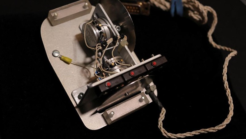 A 1960s Douglas Engelbart X-Y computer mouse is displayed during a preview of items offered in RR Auction's 