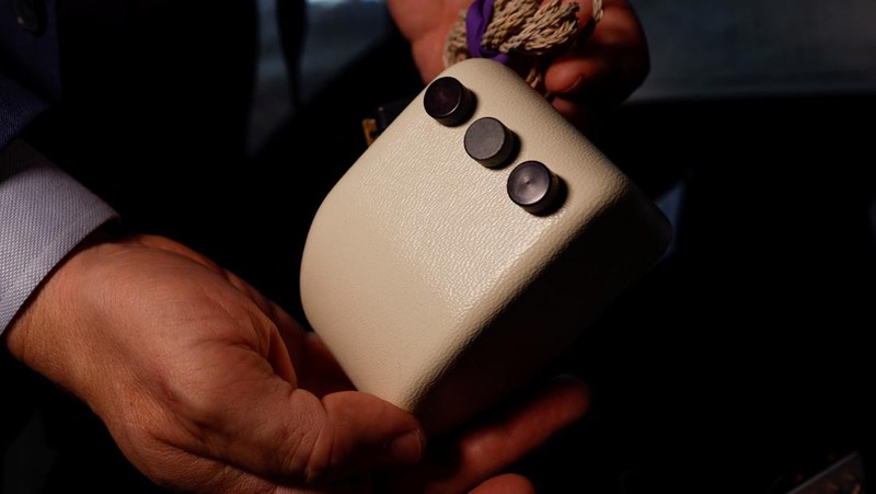 A 1960s Douglas Engelbart X-Y computer mouse is displayed during a preview of items offered in RR Auction's 