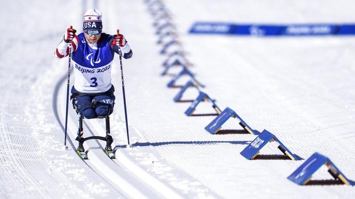 Lera Doederlein, of the United States, (LW12) competes in the Women's Middle Distance Sitting Para Biathlon for the Beijing 2022 Winter Paralympic Games in Zhangjiakou, China, Tuesday, March 8, 2022. (Thomas Lovelock/OIS via AP)