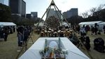 Bunga dan Doa Warnai Peringatan 11 Tahun Tsunami Jepang