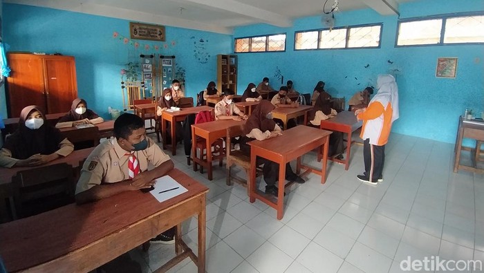 SMP N 1 Mungid, Magelang kembali menggelar PTM yang terhenti selama 2 pekan, Jumat (11/3/2022).