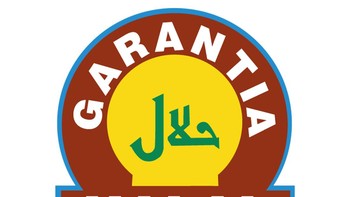 Ini label halal di Spanyol dari The Halal Institute of Spain (Junta Islámica). Garantia Halal tertulis besar dengan kaligrafi Khat Kufi bertulisan halal. Foto: The Halal Institute of Spain Junta Islámica