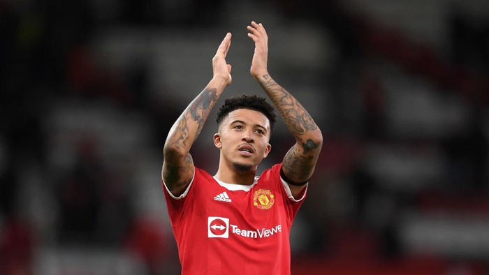 MANCHESTER, ENGLAND - MARCH 12: Jadon Sancho of Manchester United in action during the Premier League match between Manchester United and Tottenham Hotspur at Old Trafford on March 12, 2022 in Manchester, England. (Photo by Michael Regan/Getty Images)